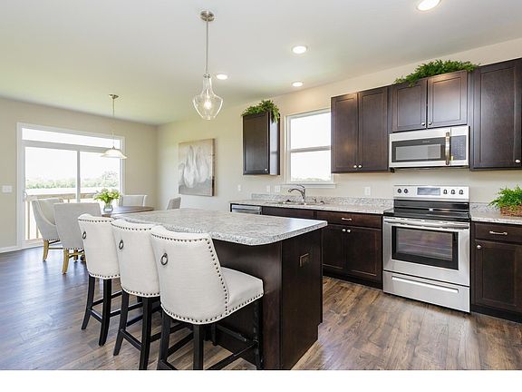 Kitchen With Center Island and Breakfast Bar