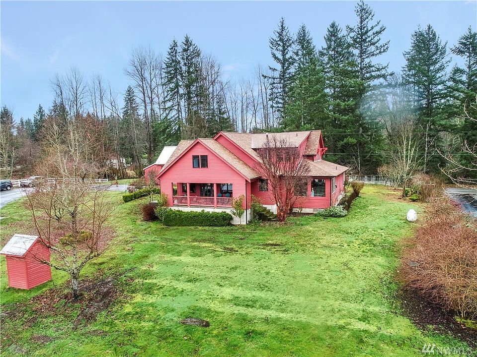 Gorgeous turn of the century farmhouse situated on 6.79 acres. Surrounded by white vinyl fencing.