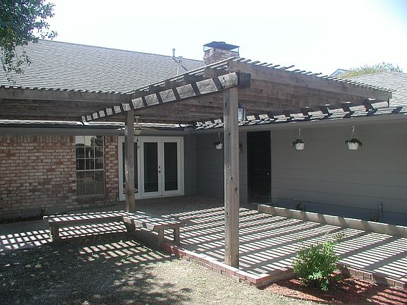 Shady relaxing pergola in back yard