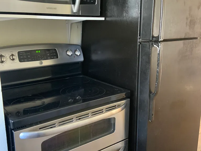 Microwave above stove.