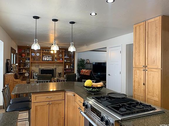 Kitchen has stainless steel appliances.