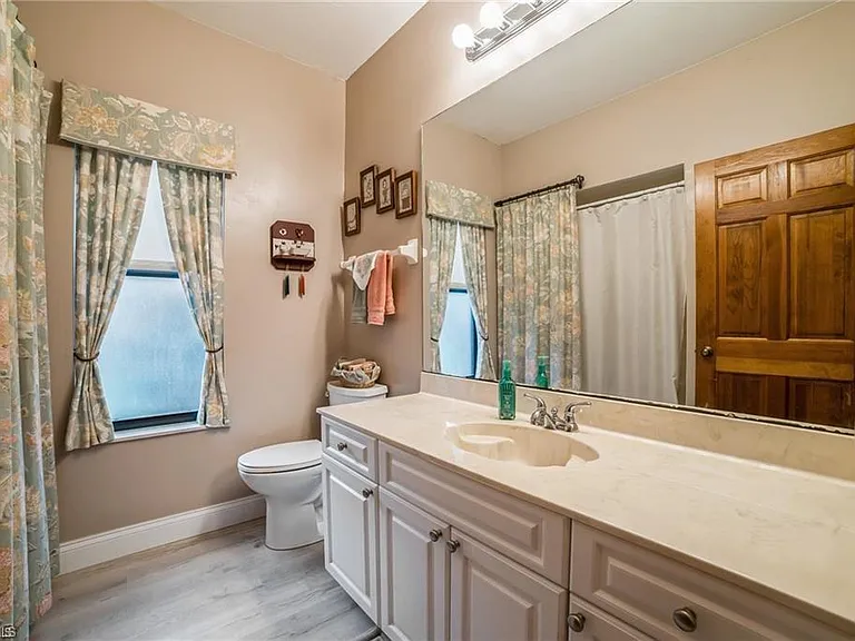 5980 Hidden Oaks Ln — Photo 16