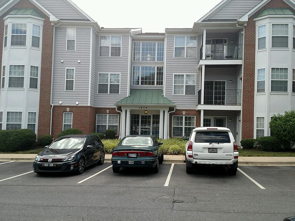 Secure front entrance. Common area meticulously maintained. Unit is 1flight up in back with nice rear green view.