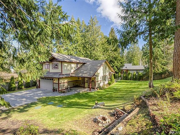 The home is set on a half-acre corner lot with nice privacy.