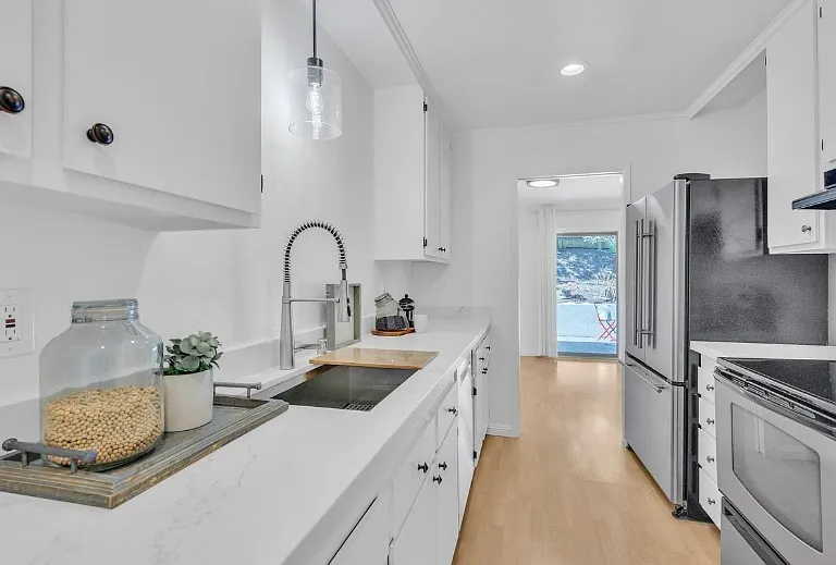 Updated kitchen with marble counters