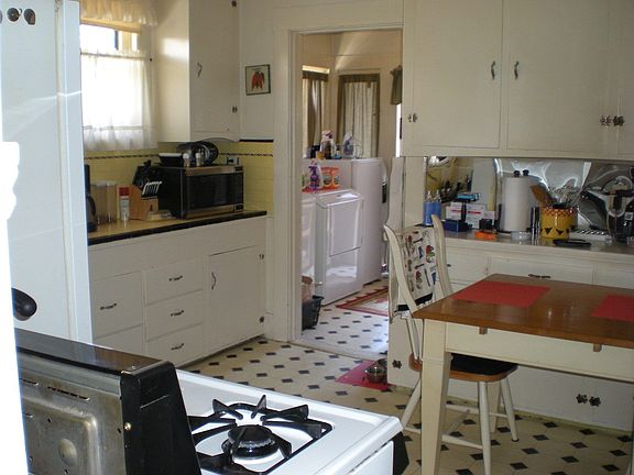 Large eat in kitchen with vintage tiles