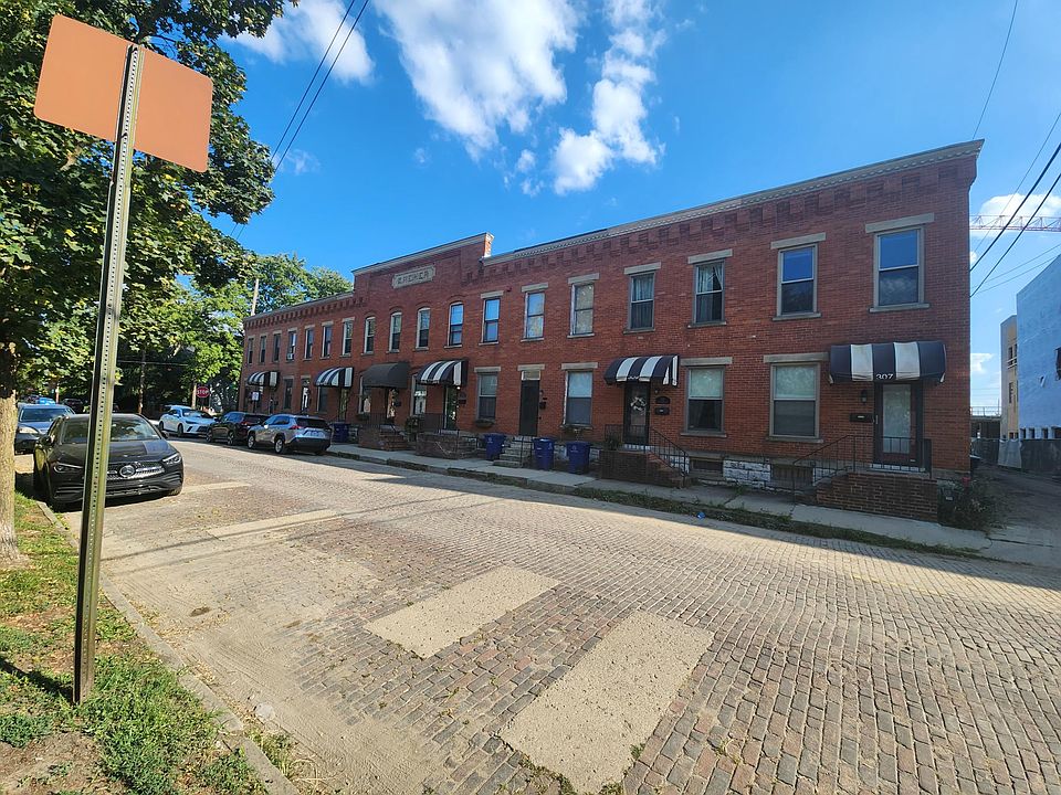 Two bedroom, one and a half bath is the second to left-most row-house unit of the historic Kremer building.