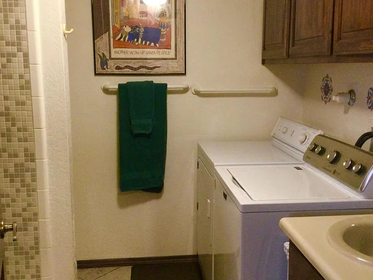 The 3rd full bath is also the laundry room.