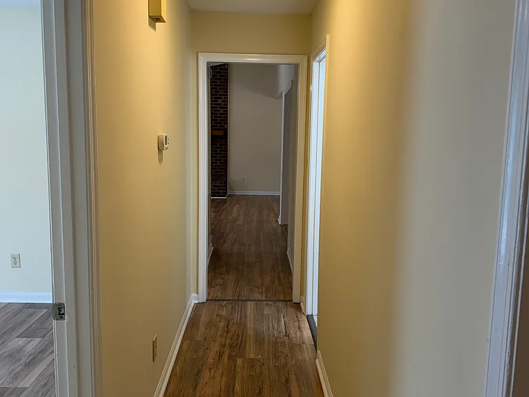 Hallway with all 3 bedrooms and hall bath