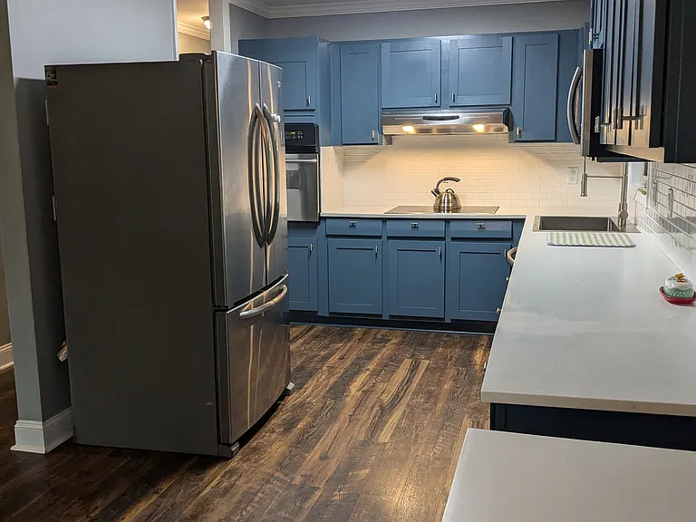 View of kitchen from dining/living area