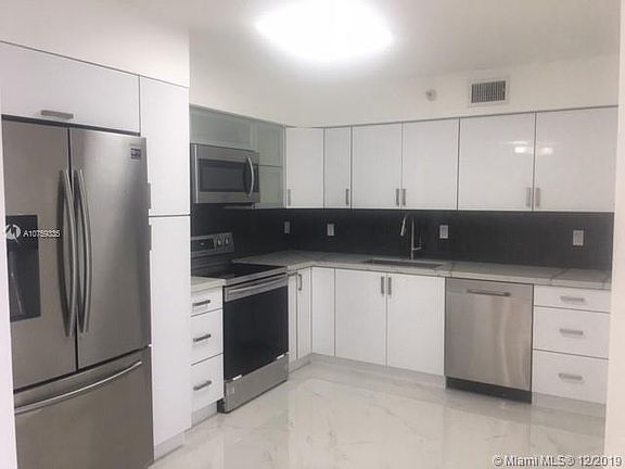 5th image of 3530 Mystic Pointe Dr APT 2812