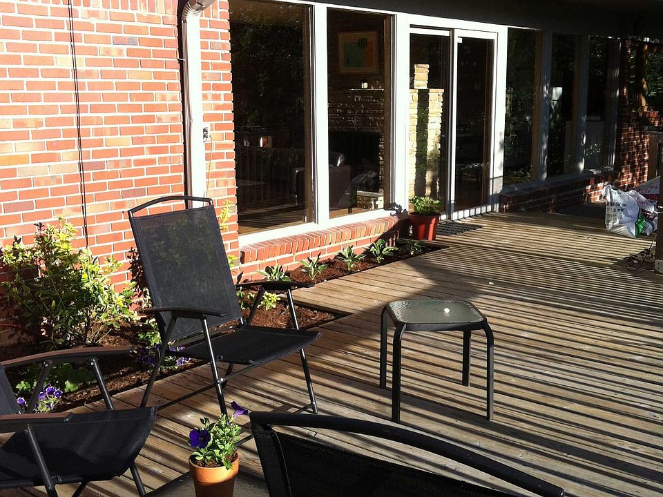 Sliding glass onto deck overlooking wooded lot
