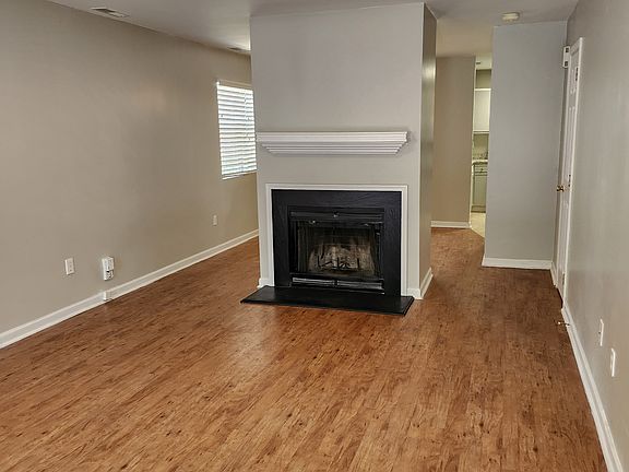 Living room 
1/2 bathroom to the right
Dining room behind the fireplace