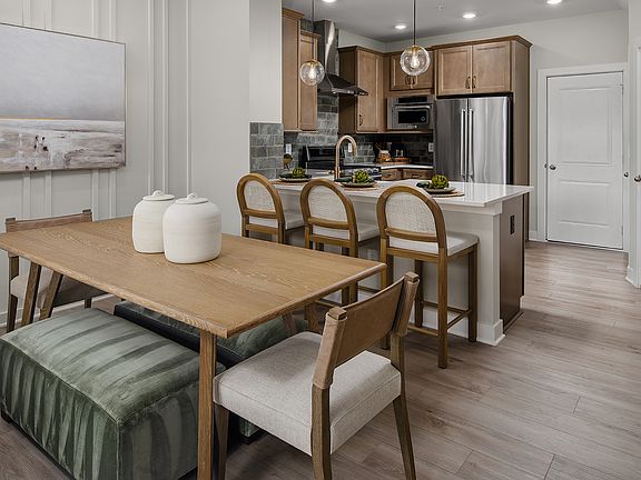 Dining Space Opening to the Gourmet Kitchen