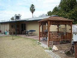 Large yard with gazebo and covered patio