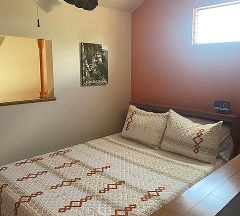 Upstairs Bedroom with a full size bed