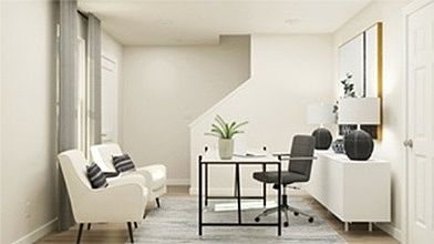 Front door large sitting area with half bath and garage entrance