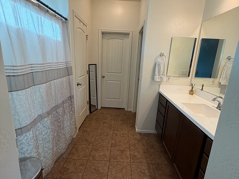 17621 W Daley Ln — Photo 45