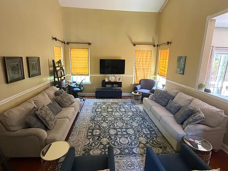 family room with cathedral ceilings