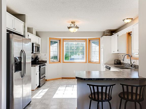 4th image of 10950 Able St NE