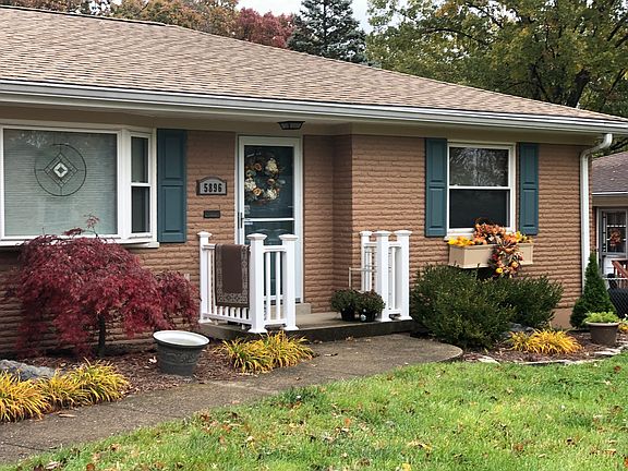 Front of house with new roof