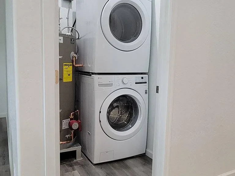 laundry room with high capacity washer and dryer