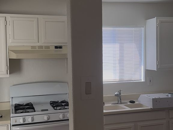Kitchen open to living room.