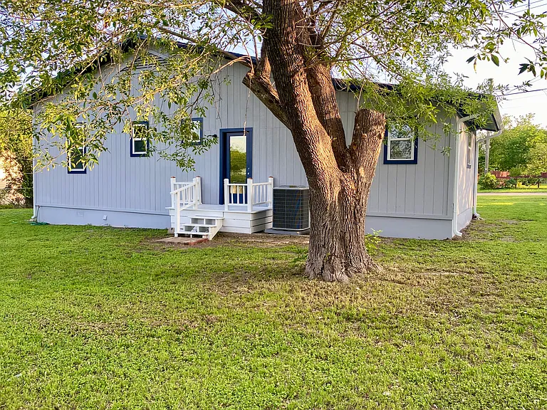 Back of house and yard.