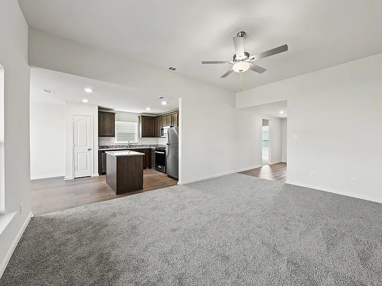 The spacious family room has plenty of room for furniture.