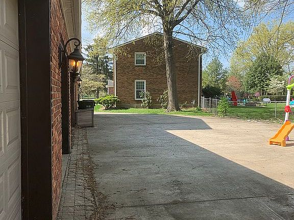 Driveway And 4 Car Garage