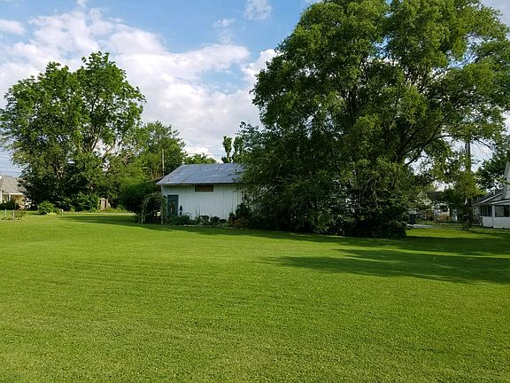 Side yard with storage barn