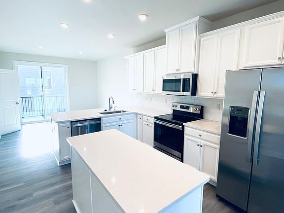 Kitchen, Dining and Balcony View
