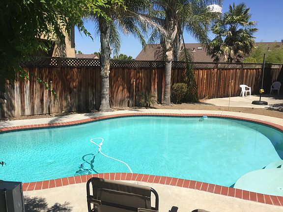 Large Swimming Pool in the backyard