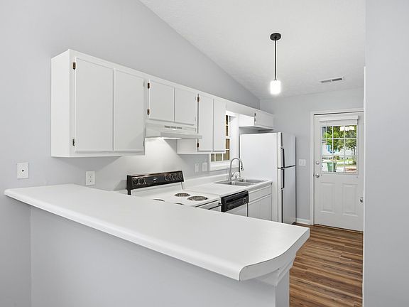Open concept from kitchen into the living room