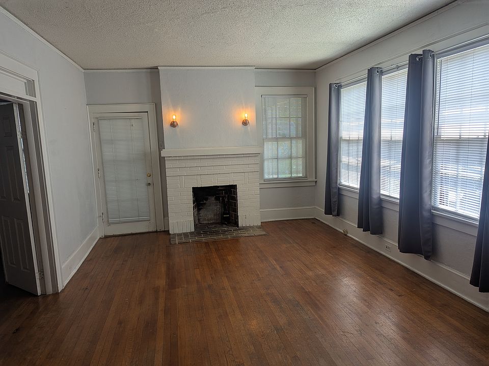 Large living & dining with private covered porch through glass door