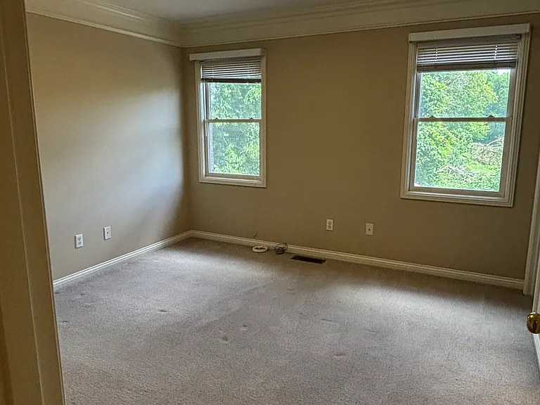 Upstairs spare bedroom with large closet and bathroom.