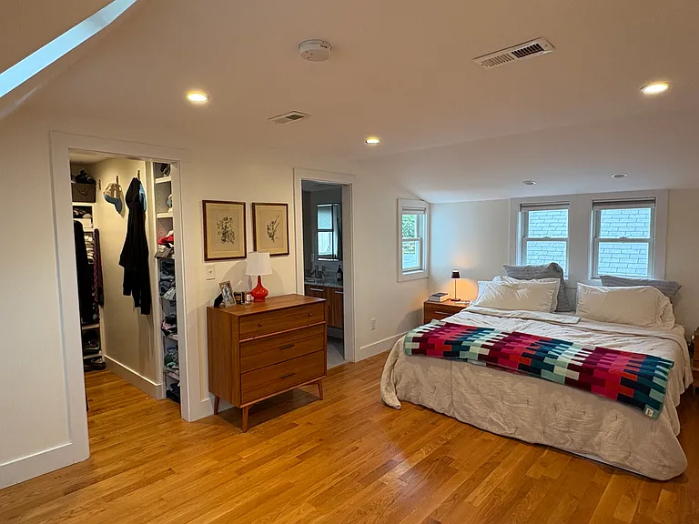 The master suite has a walk in closet, en suite bathroom, and washer and dryer in a separate closet.
