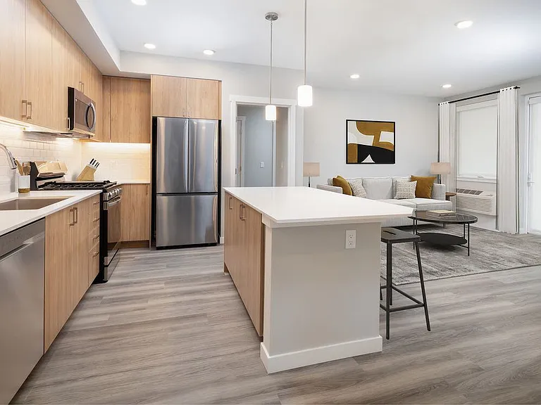 Kitchen and living room with hard surface flooring