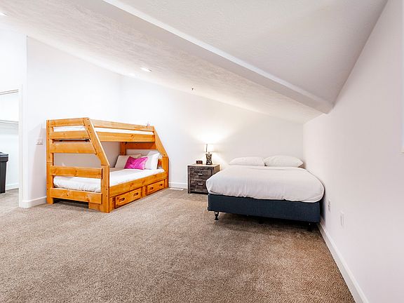 Upstairs Living Area With Twin-over-Full Bunk and a Double Bed
