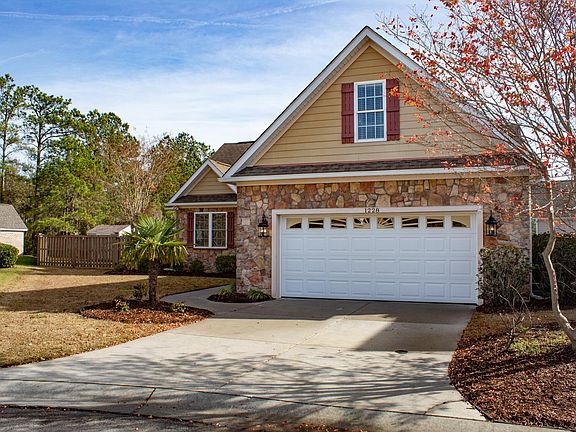 Garage/driveway (two car driveway and two car garage)