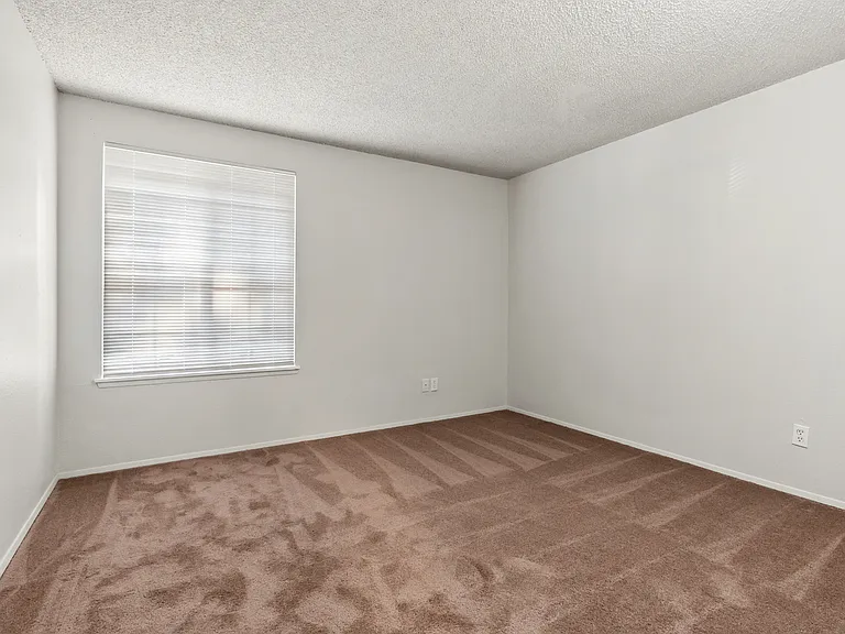Experience the serenity of this bright and inviting bedroom, ready for your personal touch. Experience the serenity of this bright and inviting bedroom, ready for your personal touch.