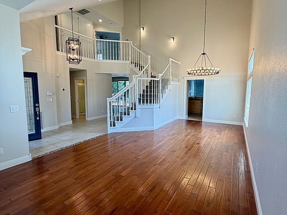 Warm Spacious Home with vaulted ceilings with new updated lighting and paint