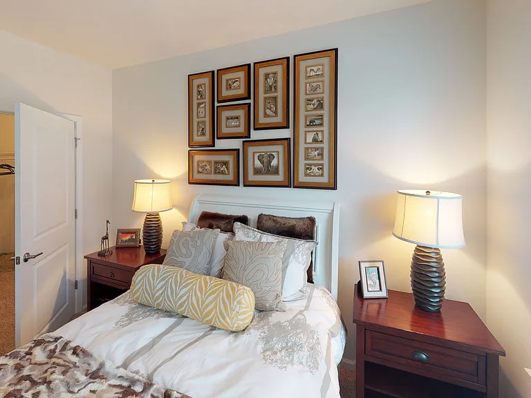 Plush bedroom with expansive closets