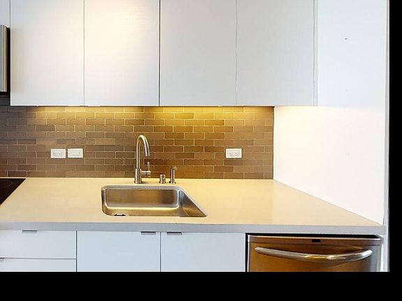 Luxe kitchen featuring the latest appliances and fixtures