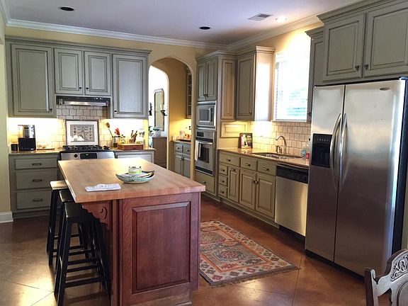 Beautiful kitchen with Stainless appliances.