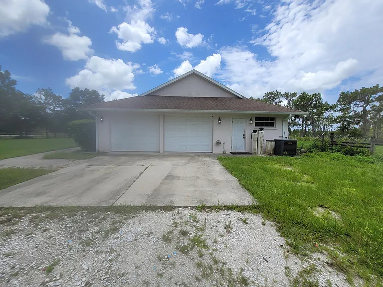 Garage and Driveway side of home