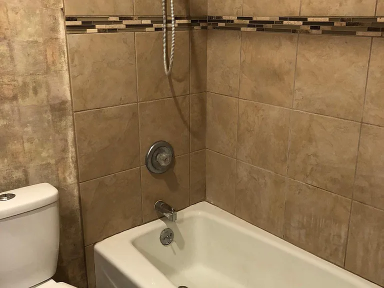 Full Bath off pool. Deluxe marble vanity. Shower massage head upgrade.