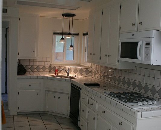 All white galley kitchen
