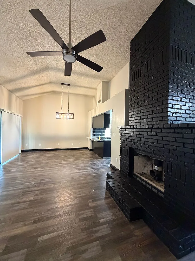 Save on Utilities! Corner Lot Home with Paid Solar, Vivint Security & Gardening Included — Photo 4