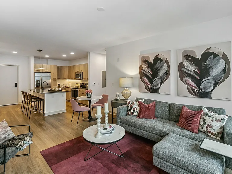 Stretch out and relax in this thoughtfully designed space with a cozy living area and connected kitchen.